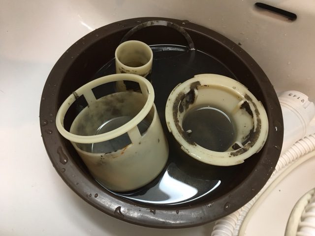 東京都千代田区で洗濯機排水口のつまりを修理してきました